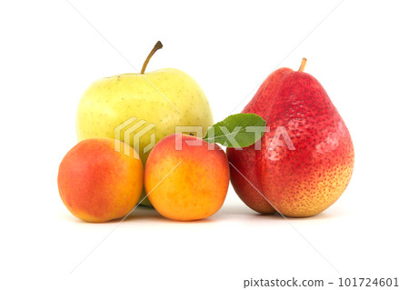 Green apple, apricots and pear isolated on a white Green apple, apricots and pear isolated on a white 101724601