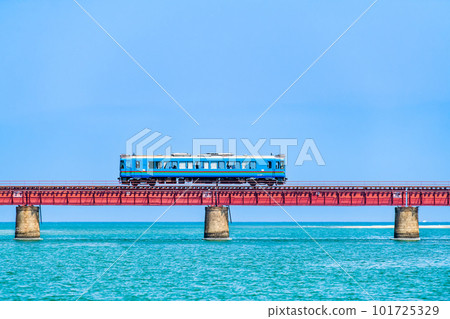 Kyoto Tango Railway Train crossing the Yura River Bridge 101725329