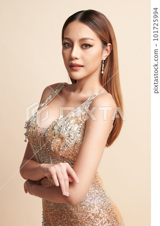 Beautiful young asian woman, with gold Dress,... - Stock Photo [101725994]  - PIXTA