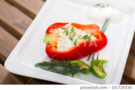 Stuffed delicious half of red pepper with brynza, Bulgarian cuisine 101726336