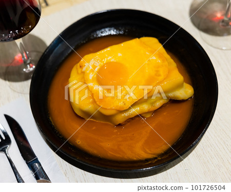 Just cooked francesinha served in bowl Just cooked francesinha served in bowl 101726504