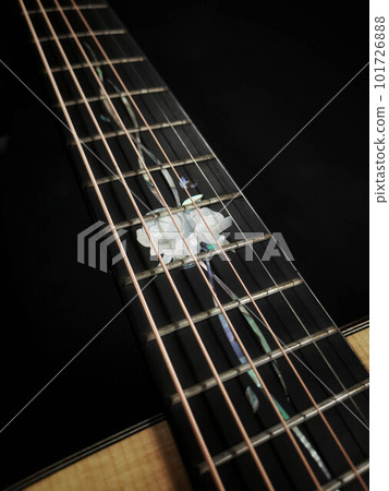 close up shot of fingerboard guitar , ebony wood fingerboard with abalone mark close up shot of fingerboard guitar , ebony wood fingerboard with abalone mark 101726888