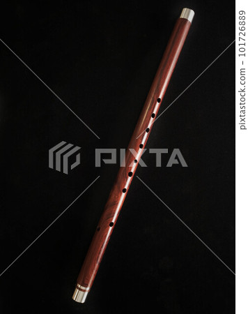 Thai flute. Flute made from siam rosewood with aluminum wrap design Thai flute. Flute made from siam rosewood with aluminum wrap design 101726889