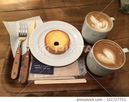 Cheese tart and cappuccino 101727751