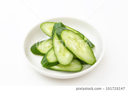 Sliced cucumber white background Sliced cucumber white background 101728147