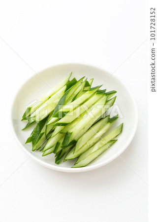 Shredded cucumber white background 101728152