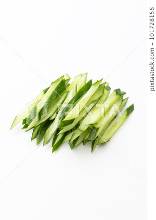 Shredded cucumber white background Shredded cucumber white background 101728158