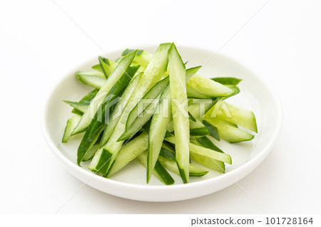 Shredded cucumber white background 101728164