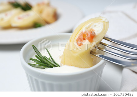 Concept of tasty food, thin pancakes with filling Concept of tasty food, thin pancakes with filling 101730482