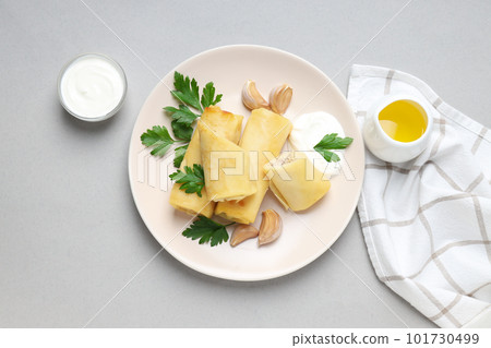 Concept of tasty food, thin pancakes with filling, top view 101730499
