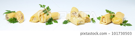 Concept of tasty food, thin pancakes with filling 101730503