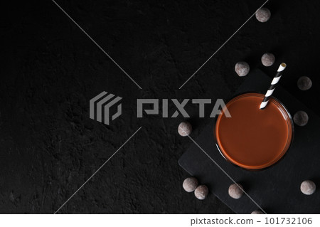 Tasty fresh summer dessert - chocolate milkshake, space for text Tasty fresh summer dessert - chocolate milkshake, space for text 101732106