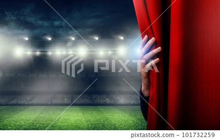 Hand are opening the soccer stadium. The football match is about to begin Hand are opening the soccer stadium. The football match is about to begin 101732259