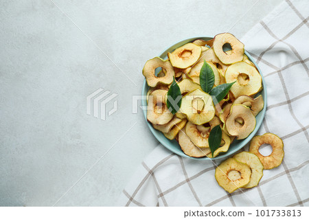 Concept of tasty food, dried apple chips, space for text 101733813