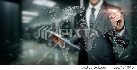Businessman works in the global network on a world map . Businessman works in the global network on a world map . 101734840