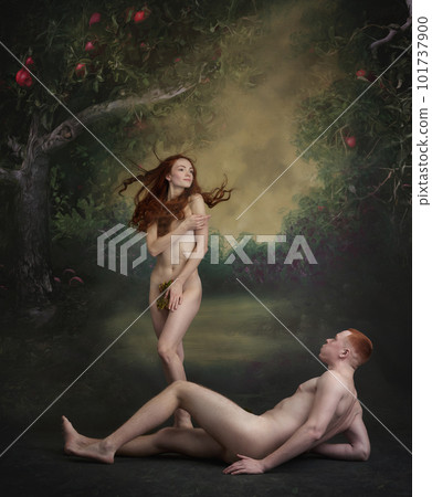 Portrait of picture Adam and charming Eve. Man and red haired woman in image of famous characters over vintage style background. Beauty of female body Portrait of picture Adam and charming Eve. Man and red haired woman in image of famous characters over vintage style background. Beauty of female body 101737900