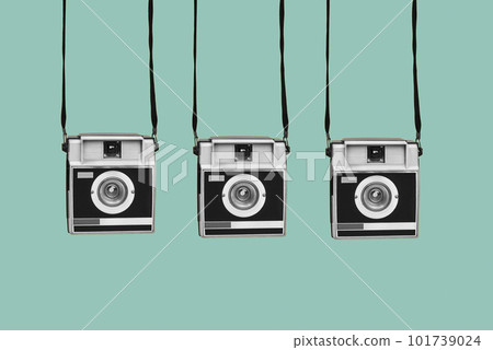 retro film cameras on a blue background 101739024