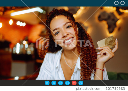 Headshot portrait screen view of young African American woman sit at home talk on video. 101739683