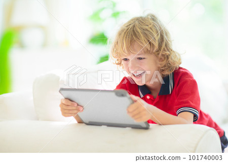 Kids with mobile phone. Child with tablet computer Kids with mobile phone. Child with tablet computer 101740003