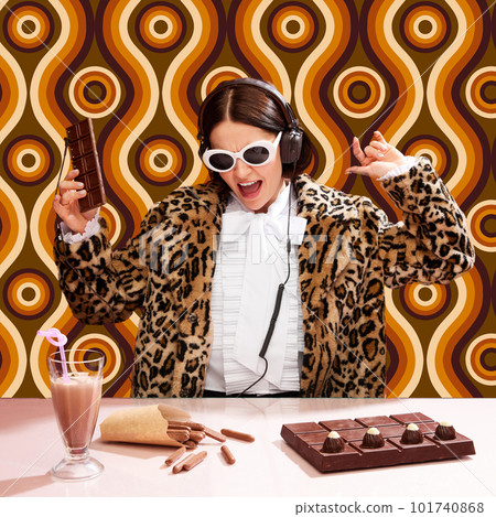 Chocolate dj station. Woman in stylish sunglasses and animal print coat playing music set with chocolate equipment. Colorful pattern background 101740868
