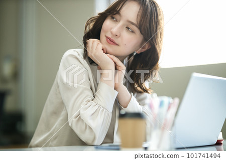 Young woman working in the office 101741494