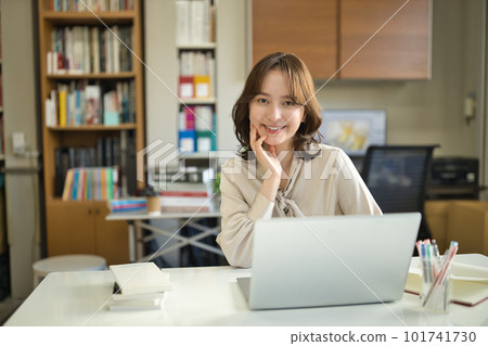 Young woman working in the office Young woman working in the office 101741730