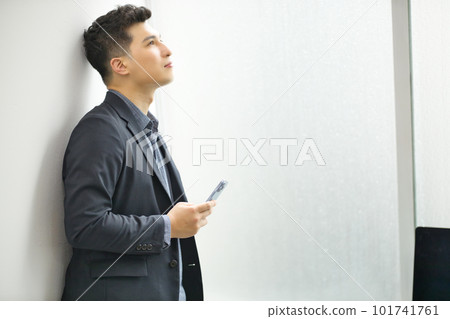 Young man with a smartphone Young man with a smartphone 101741761