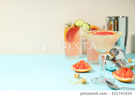 Grapefruit cocktail, alcohol or non alcoholic drink for party, space for text Grapefruit cocktail, alcohol or non alcoholic drink for party, space for text 101741854