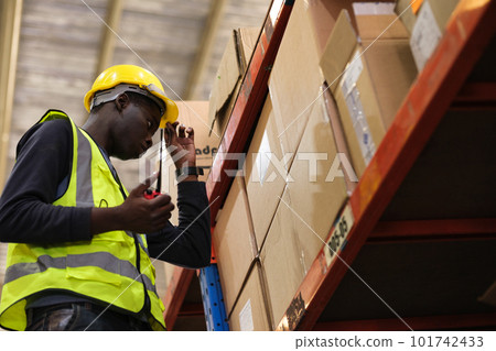 Industrial worker working at warehose factory. 101742433
