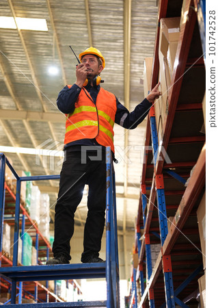 Industrial worker working at warehose factory. 101742528