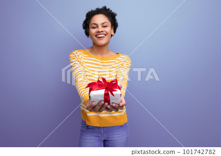 birthday girl afro brunette 20s latin young woman with gift birthday girl afro brunette 20s latin young woman with gift 101742782