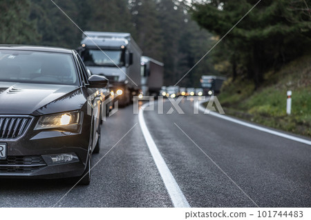 Traffic jam on a mountain road after several vehicles collided in front 101744483