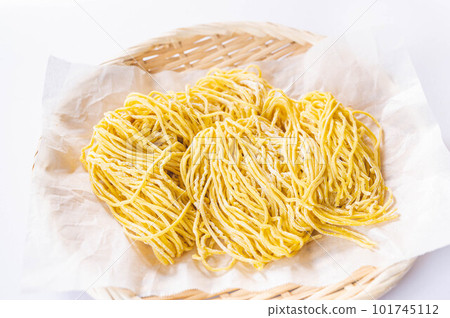 Chinese noodles on a colander Chinese noodles on a colander 101745112