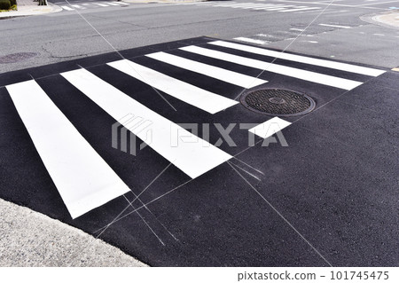 Repaired crosswalk, traffic paint, new road markings, image material, white lines 101745475