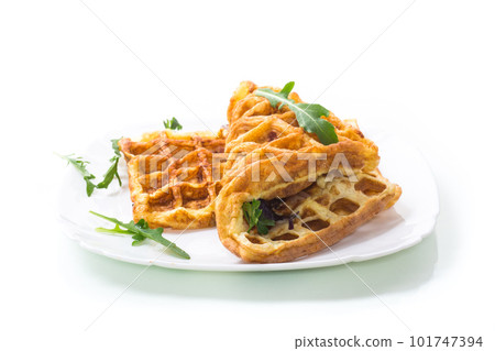 Egg omelette stuffed with onions and herbs, fried in the form of waffles Egg omelette stuffed with onions and herbs, fried in the form of waffles 101747394