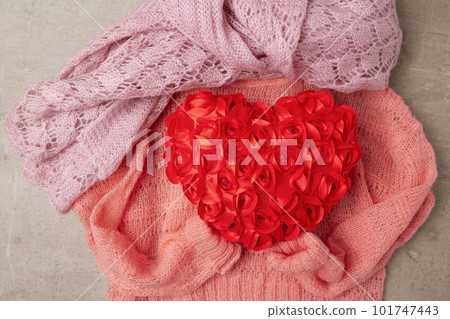 winter flat lay with scarf, red heart and sweater winter flat lay with scarf, red heart and sweater 101747443