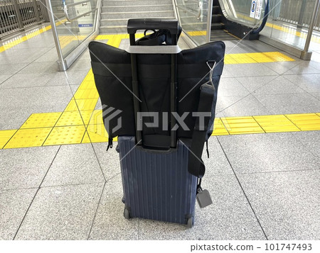 A suitcase used by a trading company man on a domestic business trip A suitcase used by a trading company man on a domestic business trip 101747493