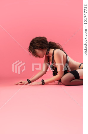 sexy nude girl in leather straps for sexy bdsm games on a pink background copy paste sexy nude girl in leather straps for sexy bdsm games on a pink background copy paste 101747738