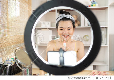 Beautiful women with social media influences recommend products and make-up accessories to be more beautiful, Recording vlog video live streaming, Online business of beauty bloggers. Beautiful women with social media influences recommend products and make-up accessories to be more beautiful, Recording vlog video live streaming, Online business of beauty bloggers. 101749341