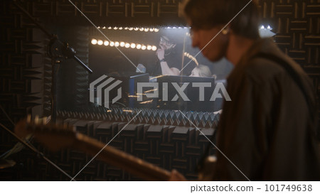 Musical band records album in soundproof room Musical band records album in soundproof room 101749638