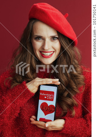 happy woman with long wavy hair, smartphone and Valentine app happy woman with long wavy hair, smartphone and Valentine app 101750141