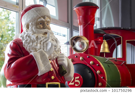 santa toy, a portrait of a santa with a beard, glasses and packets,snowflakes fall through santa toy, a portrait of a santa with a beard, glasses and packets,snowflakes fall through 101750296