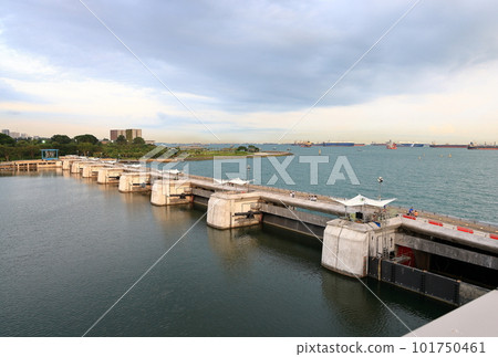 Aerial view of Marina Barrage, a large dam built at the confluence of rivers in Singapore. Aerial view of Marina Barrage, a large dam built at the confluence of rivers in Singapore. 101750461