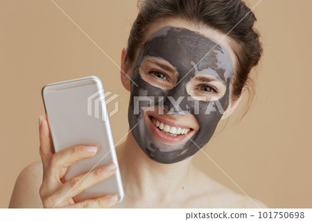 happy modern woman using smartphone happy modern woman using smartphone 101750698