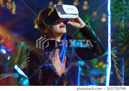 modern woman in metaverse in vr goggles exploring modern woman in metaverse in vr goggles exploring 101750746