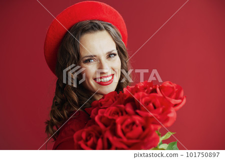 happy stylish woman in red dress and beret on red background happy stylish woman in red dress and beret on red background 101750897