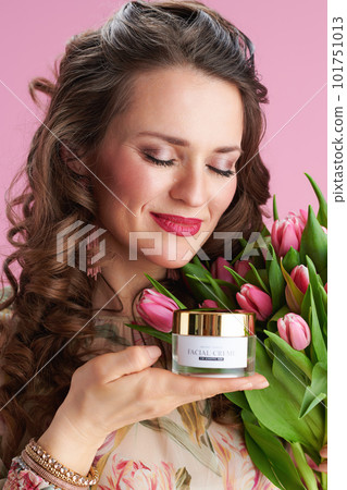 relaxed young 40 years old woman in floral dress on pink relaxed young 40 years old woman in floral dress on pink 101751013