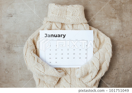 winter flat lay with january calendar and sweater winter flat lay with january calendar and sweater 101751049