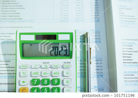 tax time. calculator and documents on desk 101751196