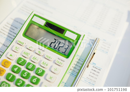 tax time. calculator and documents on table 101751198